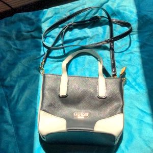 Mini hand bag that has crossbody strap